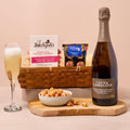 Prosecco and popcorn hamper with sparkling wine and sweet treats