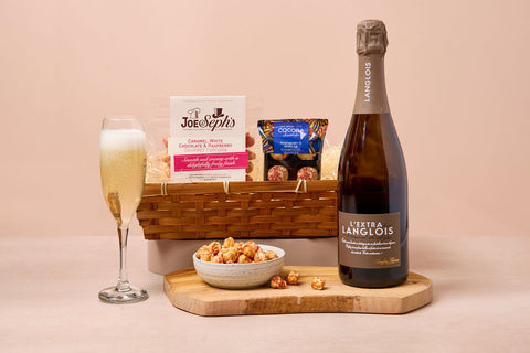 Prosecco and popcorn hamper with sparkling wine and sweet treats