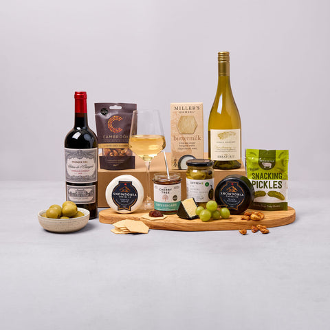 Cheese and wine lover hamper with red wine, cheeses and charcuterie
