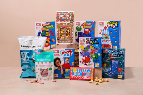 Family games night hamper with snacks, popcorn and board games