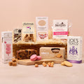 Afternoon tea gift hamper with salted caramel cake, Earl Grey tea and sweet treats