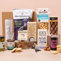 Classic food hamper with biscuits, olives, crisps, fudge and tea