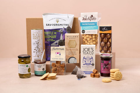 Classic food hamper with biscuits, olives, crisps, fudge and tea