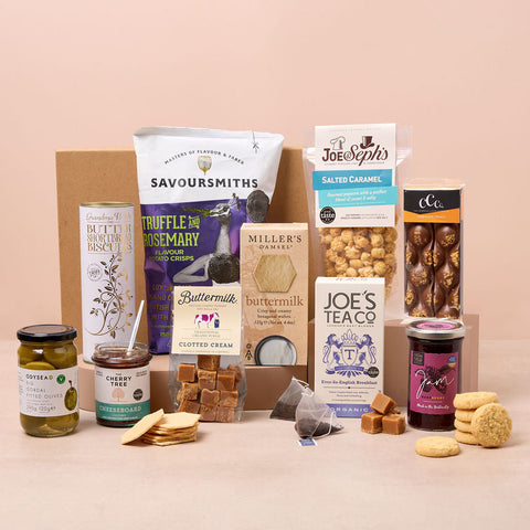 Classic food hamper with biscuits, olives, crisps, fudge and tea