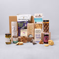 Classic food hamper with biscuits, olives, crisps, fudge and tea